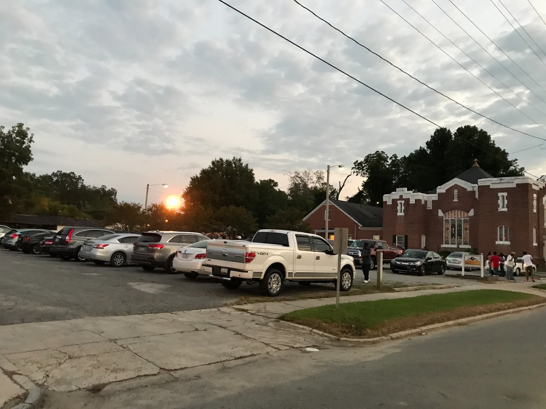 Vehicles parked on Dennis Street lot