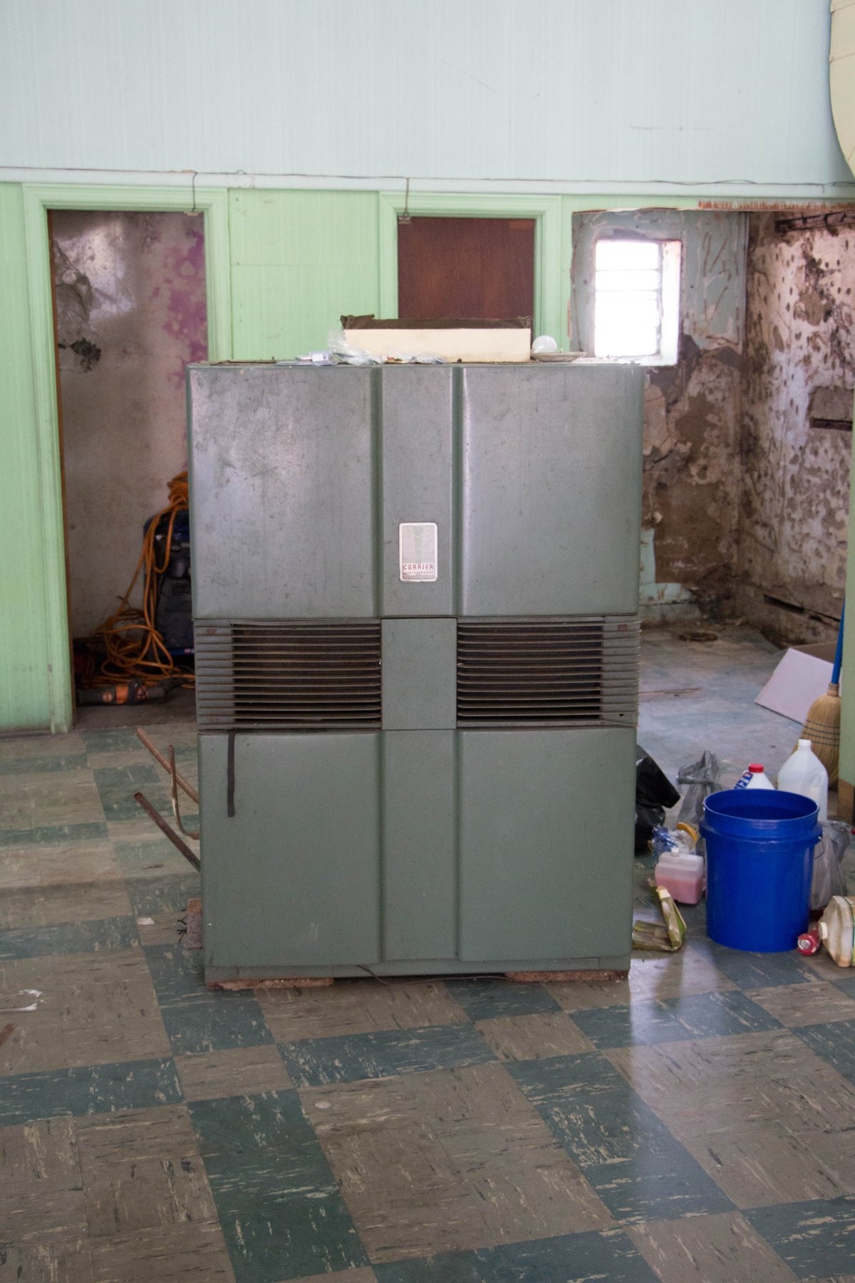 Old heating unit removed during renovation