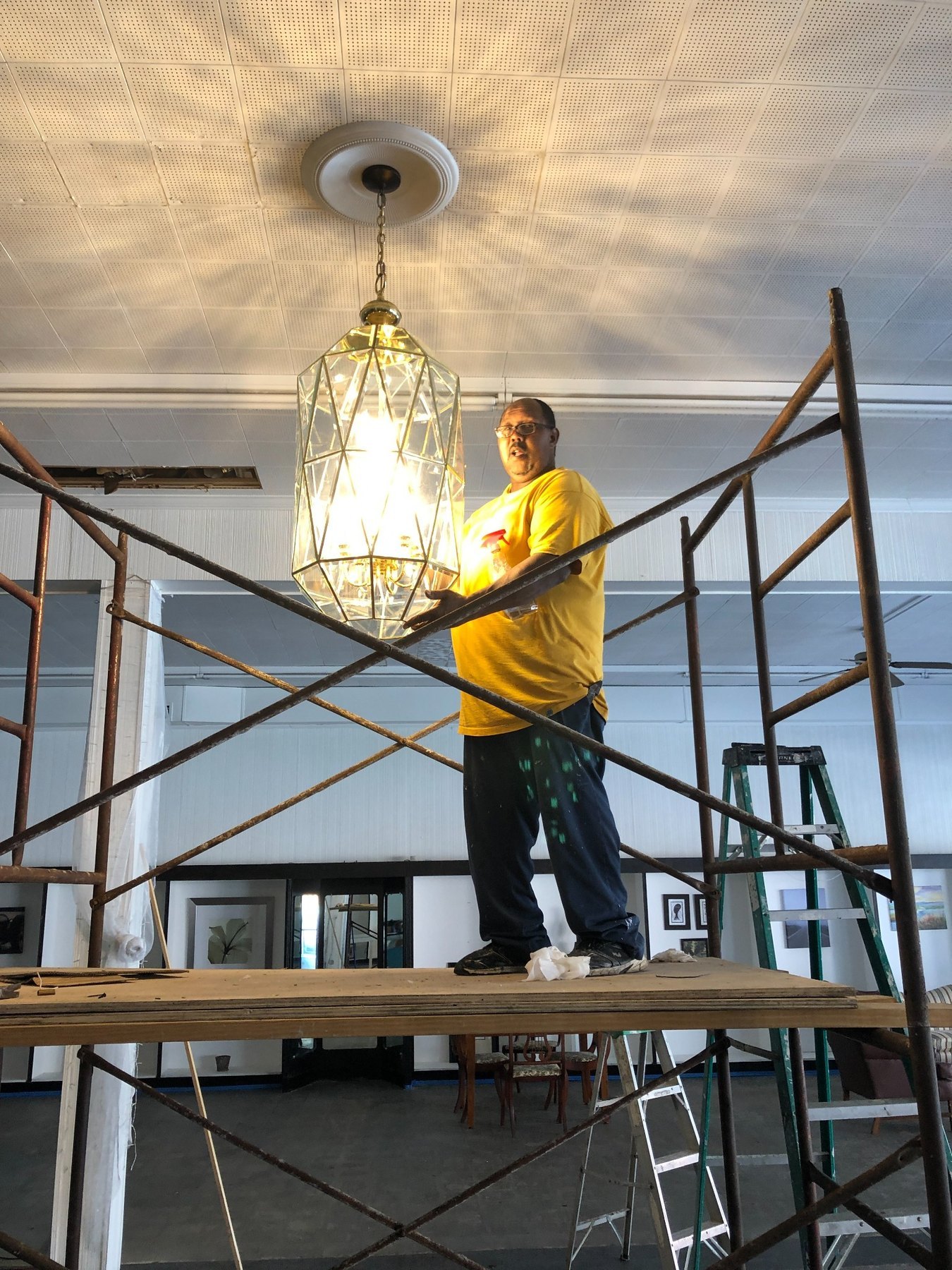 Chandelier installation inside The Collective Center