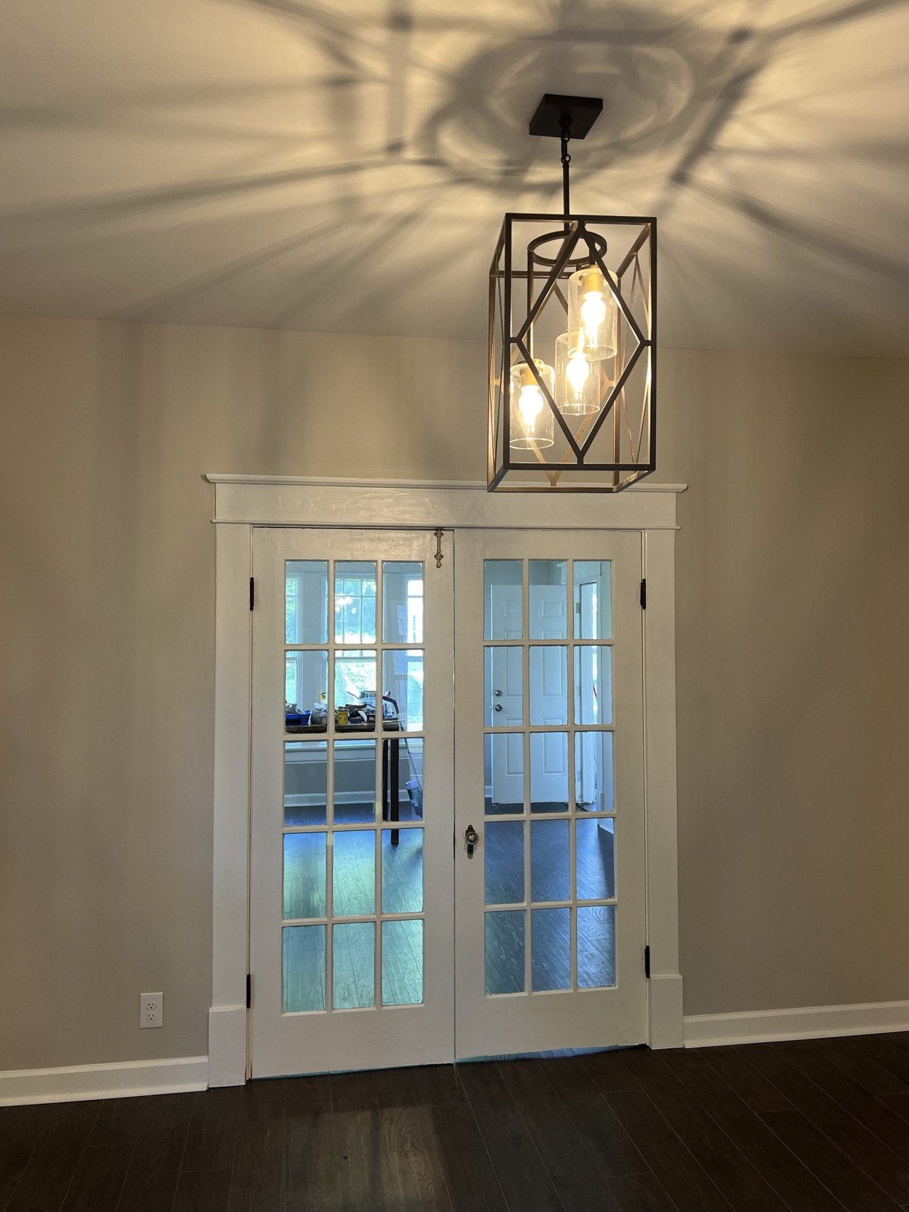 French doors and statement lighting at 225 Bond Street