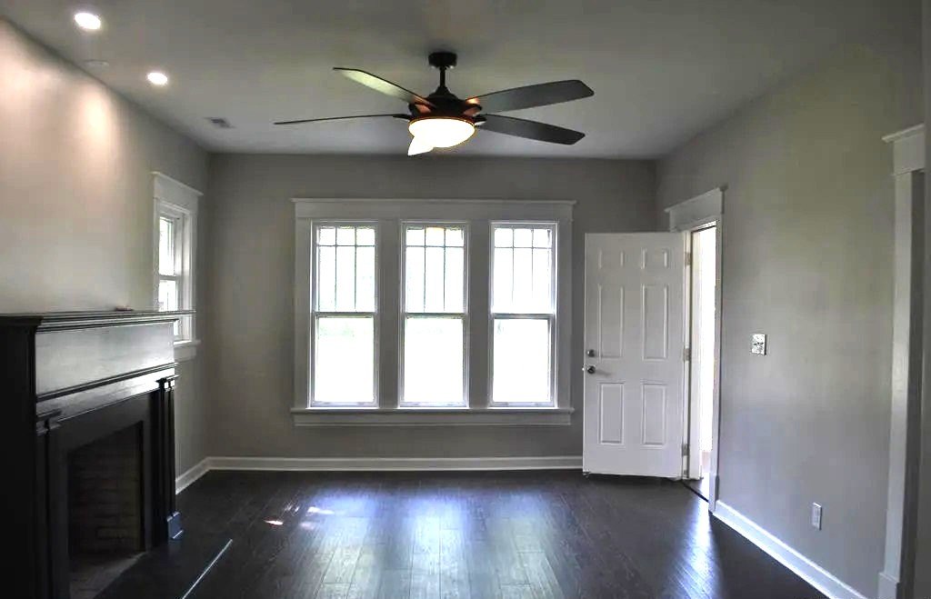 Living room with original character at 225 Bond Street